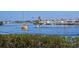 Scenic waterfront view with boats and lush greenery at 250 Santa Maria St # 118, Venice, FL 34285