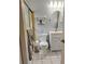Clean bathroom with shower/tub combo and white vanity at 5581 Linksman Pl, North Port, FL 34287