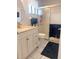 Clean bathroom with shower and updated vanity at 5581 Linksman Pl, North Port, FL 34287