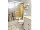 Clean bathroom with shower/tub combo and white vanity at 5581 Linksman Pl, North Port, FL 34287