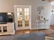 View into the Primary bedroom from the living area at 5581 Linksman Pl, North Port, FL 34287
