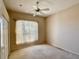 Spacious bedroom with neutral walls and carpet flooring at 25 Windsor Dr, Englewood, FL 34223