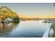 Tranquil waterfront property showcasing a calm canal at sunset at 3911 Sunrise S Dr, St Petersburg, FL 33705