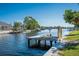 Private wooden dock extending into calm canal waters at 3911 Sunrise S Dr, St Petersburg, FL 33705