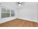 Bedroom with wood-look floors and ceiling fan at 4625 Pan American Blvd, North Port, FL 34287