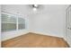 Bedroom with wood-look floors and ceiling fan at 4625 Pan American Blvd, North Port, FL 34287