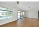 Living room with pool view and sliding glass doors at 4625 Pan American Blvd, North Port, FL 34287