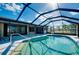 Enjoy this refreshing pool with a spacious screened enclosure at 4625 Pan American Blvd, North Port, FL 34287