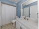 Simple bathroom with white vanity and shower/tub combo at 885 Country Club Cir # 61, Venice, FL 34293