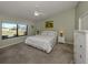 Bright bedroom with neutral decor and ample space at 885 Country Club Cir # 61, Venice, FL 34293