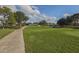 Landscaped golf course with walking path at 885 Country Club Cir # 61, Venice, FL 34293