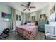Spacious bedroom with a queen bed and light walls at 129 Gulf Ave, Nokomis, FL 34275