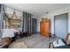 Cozy bonus room with a large wooden cabinet and gray walls at 129 Gulf Ave, Nokomis, FL 34275