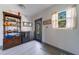 Laundry room with built-in cabinets and access to backyard at 129 Gulf Ave, Nokomis, FL 34275