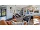 Living room with a large TV and comfortable seating at 129 Gulf Ave, Nokomis, FL 34275