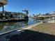 Scenic waterfront view with calm waters and palm trees at 335 Palm Grove Ave, Englewood, FL 34223