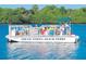 Image of the South Venice Beach Ferry carrying passengers along the waterway at 589 Mistiflower Cir, Nokomis, FL 34275