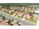 Bird's-eye view of a house near a lake at 620 Lakescene Dr, Venice, FL 34293