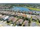 Aerial view of neighborhood with lake at 620 Lakescene Dr, Venice, FL 34293