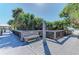 Beach access boardwalk with bench and outdoor shower at 620 Lakescene Dr, Venice, FL 34293