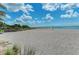Expansive beach with volleyball net, perfect for recreation at 620 Lakescene Dr, Venice, FL 34293