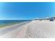 Scenic beach with calm water and white sand at 620 Lakescene Dr, Venice, FL 34293