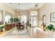 Spacious dining area with a large table and beautiful tiled floors at 620 Lakescene Dr, Venice, FL 34293