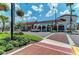 Scenic streetscape featuring various shops and businesses at 620 Lakescene Dr, Venice, FL 34293