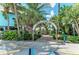 Entrance to Venice Fishing Pier, surrounded by lush greenery at 620 Lakescene Dr, Venice, FL 34293