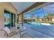 Relaxing pool and patio area with screened enclosure at 620 Lakescene Dr, Venice, FL 34293