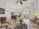 Open living and dining area with a view of the backyard at 804 Amaryllis Ln, Venice, FL 34292