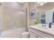 Clean bathroom with a shower/tub combo and white vanity at 13097 Rinella St, Venice, FL 34293