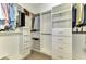 Spacious walk-in closet with ample shelving and hanging space at 13097 Rinella St, Venice, FL 34293