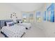 Charming bedroom with twin beds and nautical decor at 26056 Seastone Dr, Englewood, FL 34223