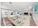 Open concept dining area adjacent to the kitchen and living room at 26056 Seastone Dr, Englewood, FL 34223