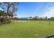 Community dog park with covered seating area at 26056 Seastone Dr, Englewood, FL 34223