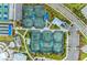 Community tennis courts with seating and parking at 26056 Seastone Dr, Englewood, FL 34223