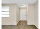 Entryway with tile floor and white door at 1323 Karen Dr, Venice, FL 34285