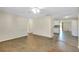 Living room with tile floor and kitchen view at 1323 Karen Dr, Venice, FL 34285