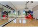 Bright fitness center with various exercise equipment and large windows at 134 Savona Way, North Venice, FL 34275