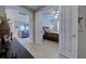 Guest bedroom with queen bed, dresser, and ceiling fan at 19764 Ortona St, Venice, FL 34293