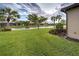 Peaceful backyard view of canal and homes at 19764 Ortona St, Venice, FL 34293