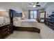 Large main bedroom with dark wood furniture and plenty of natural light at 19764 Ortona St, Venice, FL 34293