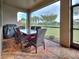 Outdoor dining area with seating for six at 19764 Ortona St, Venice, FL 34293