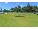 Community dog park with agility equipment and shaded seating at 21621 Winter Park Ct, Venice, FL 34293