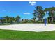 Beach volleyball court with sand and net at 21621 Winter Park Ct, Venice, FL 34293