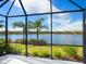 Spacious screened lanai with lake and conservation views at 21621 Winter Park Ct, Venice, FL 34293