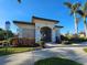 Community center with gated entrance and landscaping at 2501 Sherman Oak Dr, North Port, FL 34289