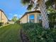 Side view of house showcasing landscaping and exterior at 2501 Sherman Oak Dr, North Port, FL 34289