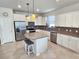 Modern kitchen with granite countertops and stainless steel appliances at 2501 Sherman Oak Dr, North Port, FL 34289